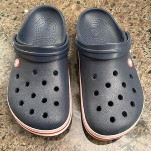 Red, white and blue adult crocs. Size 9 women, 7 men